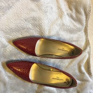 Lizard skin looking red heels.